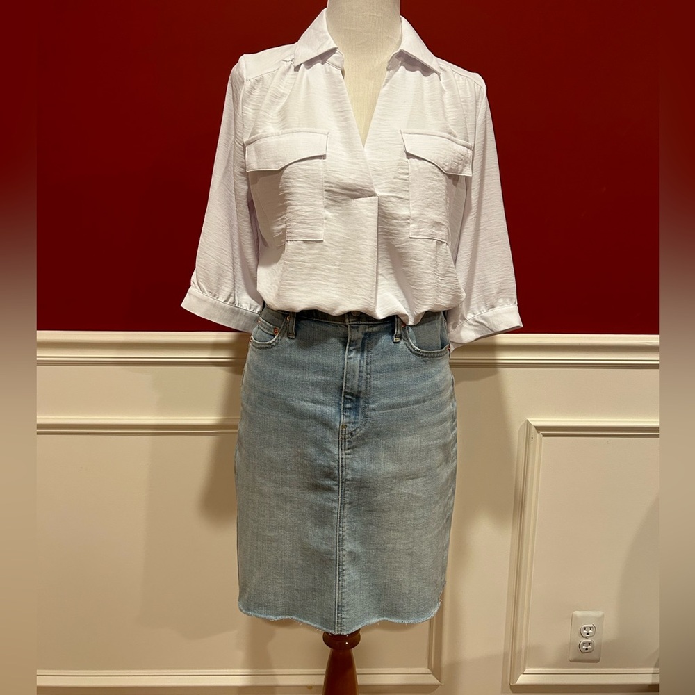 Denim skirt. Size 28. 20 inches long.